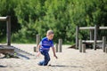 Child in playground, kid in action playing Royalty Free Stock Photo