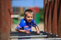 Child in playground, kid in action playing Royalty Free Stock Photo