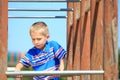 Child in playground, kid in action playing Royalty Free Stock Photo