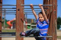 Child in playground, kid in action playing Royalty Free Stock Photo