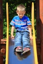 Child in playground, kid in action playing Royalty Free Stock Photo