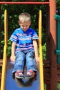 Child in playground, kid in action playing Royalty Free Stock Photo