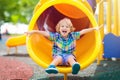 Child on playground. Kids play outdoor Royalty Free Stock Photo