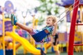 Child on playground. Kids play outdoor Royalty Free Stock Photo