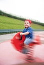 Child on playground spring