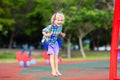 Child on playground. swing Kids play outdoor Royalty Free Stock Photo