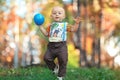 Child playing with ball in park Royalty Free Stock Photo