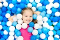 Kids play in ball pit. Child playing in balls pool