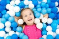 Kids play in ball pit. Child playing in balls pool Royalty Free Stock Photo