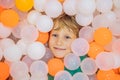 Child playing in ball pit. Colorful toys for kids. Kindergarten or preschool play room. Toddler kid at day care indoor Royalty Free Stock Photo