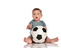 The child playing with a ball on a white background Royalty Free Stock Photo