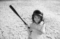 Child playing Baseball. Batter in youth league getting a hit. Boy kid hitting a baseball. Royalty Free Stock Photo