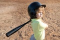 Child playing Baseball. Batter in youth league getting a hit. Boy kid hitting a baseball. Royalty Free Stock Photo