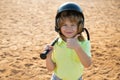 Child playing Baseball. Batter in youth league getting a hit. Boy kid hitting a baseball. Thumbs up. Royalty Free Stock Photo