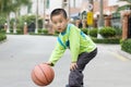 A child playing basketball