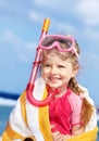 Child playing on beach.