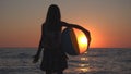 Child Playing Beach Ball in Sunset, Kid Watching Sea Waves, Girl View at Sundown Royalty Free Stock Photo
