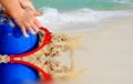 Child Playing in Beach Sand Royalty Free Stock Photo