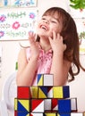 Child playing block in play room. Royalty Free Stock Photo