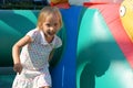 Child playing in bouncy castle Royalty Free Stock Photo