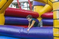 child playing in bouncy castle Royalty Free Stock Photo