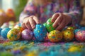 A child is playing with a bunch of colorful Easter eggs