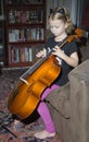 Child playing a cello Royalty Free Stock Photo