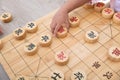 The child is playing Chinese chess seriously Royalty Free Stock Photo