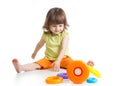 Child playing with color pyramid toy Royalty Free Stock Photo