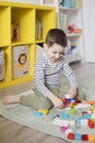 Child playing with colorful toy blocks Royalty Free Stock Photo