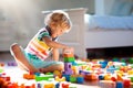 Child playing with colorful toy blocks. Kids play Royalty Free Stock Photo