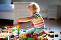 Child playing with colorful toy blocks. Kids play Royalty Free Stock Photo