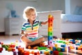 Child playing with colorful toy blocks. Kids play Royalty Free Stock Photo