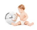 Child playing with disco ball Royalty Free Stock Photo