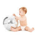 Child playing with disco ball Royalty Free Stock Photo