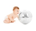 Child playing with disco ball Royalty Free Stock Photo