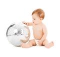 Child playing with disco ball Royalty Free Stock Photo