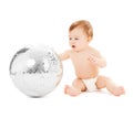 Child playing with disco ball Royalty Free Stock Photo