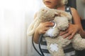 child playing doctor with soft toy. girl examining bunny with stethoscope Royalty Free Stock Photo