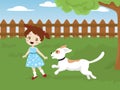 Child playing with a dog