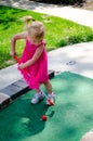 child playing golf