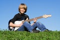 Child playing guitar Royalty Free Stock Photo