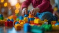 A child playing with a large amount of colorful building blocks, AI