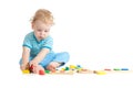 Child playing logical education toys with interest