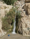 A Child Playing in the Lower Waterfall in Nahal David in Israel