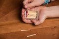 Child playing with matches Royalty Free Stock Photo