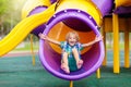 Child on playground. Kids play outdoor