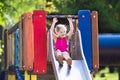 Child playing on outdoor playground in summer Royalty Free Stock Photo