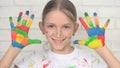 Child Playing Painted Hands Looking in Camera, Smiling School Girl Face, Kids Royalty Free Stock Photo