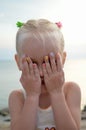 Child is playing peek-a-boo Royalty Free Stock Photo